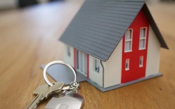 Modern real estate photography setup with camera and home interior