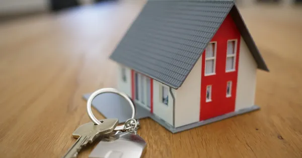 Modern real estate photography setup with camera and home interior