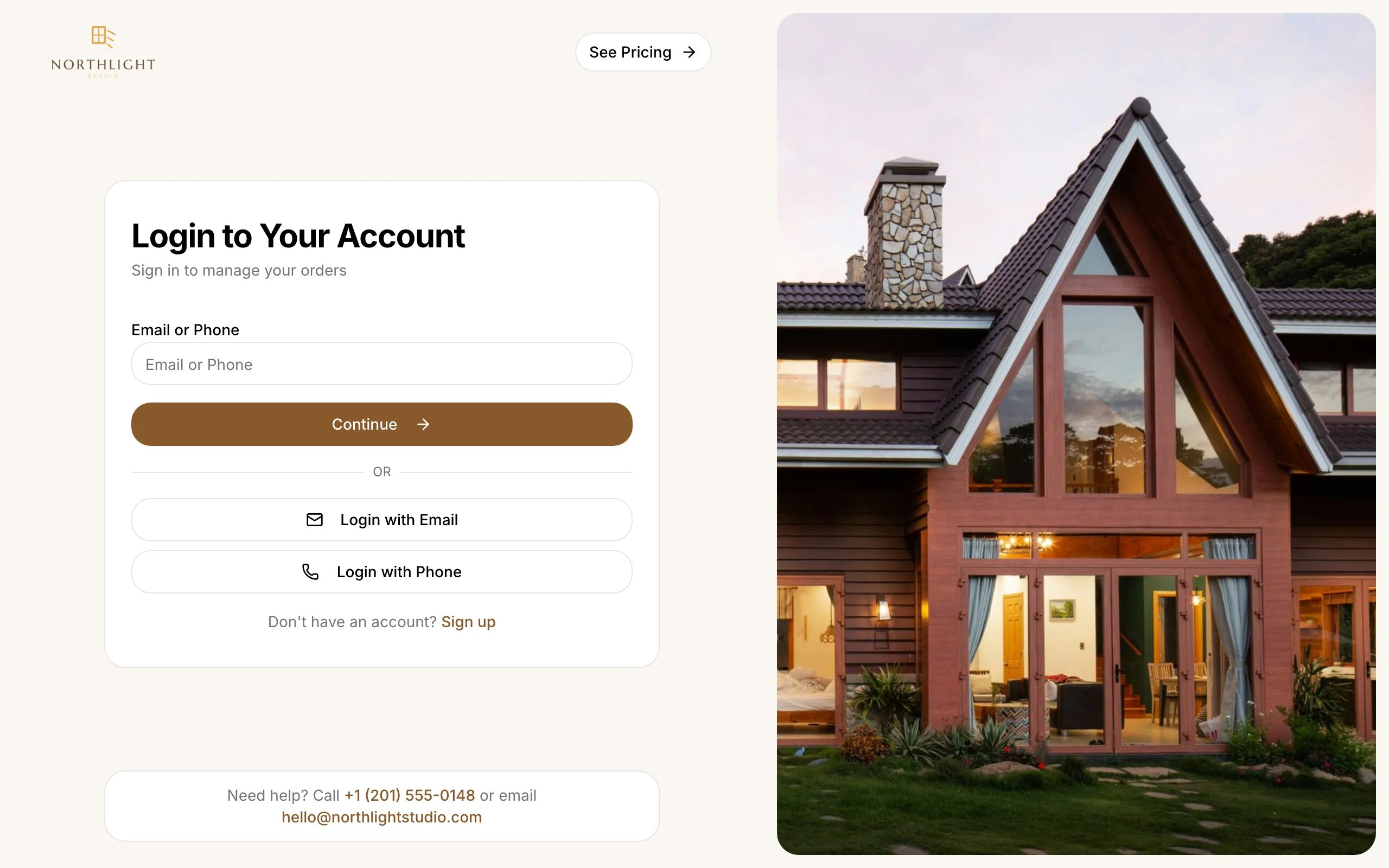 Northlight Studio's login page: brown, pill-shaped buttons on cream, beside a photo of a timber house at dusk